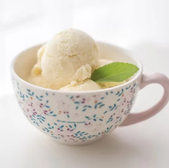 Beverages and dairy drinks stabilized with modified starch suspension systems