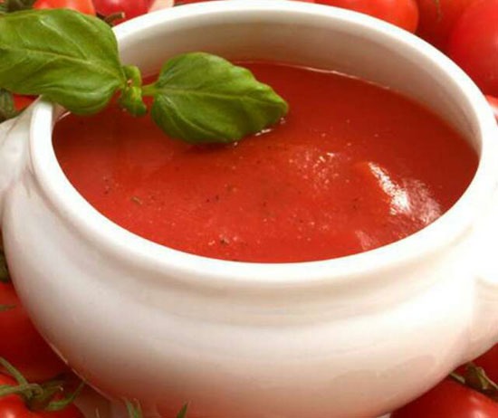 Smooth red tomato sauce in a bowl — modified starch solutions for ketchup, dressings and condiments